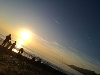 Scenic view of sea against sky at sunset