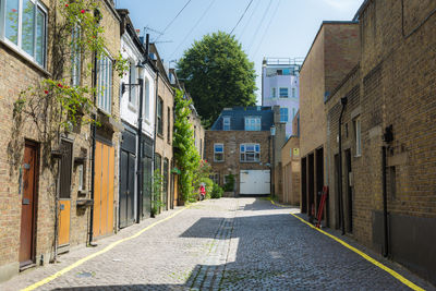 Old narrow street and stone house in notting hill, london.