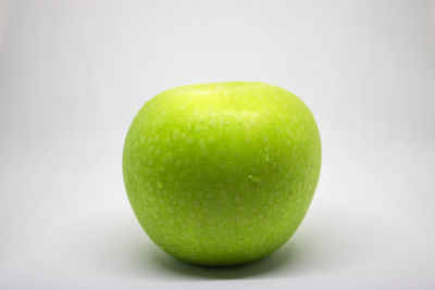 Close-up of apple against white background