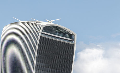 Low angle view of modern building against sky