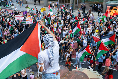 High angle view of people on street in city