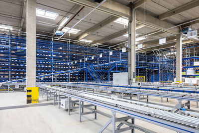 Empty conveyor belt in warehouse