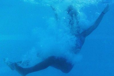 Scenic view of sea with mountains in background
