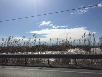 View of calm countryside lake against the sky