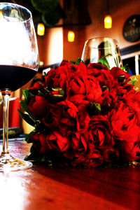 Close-up of red flowers on table