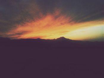 Scenic view of landscape against sky during sunset