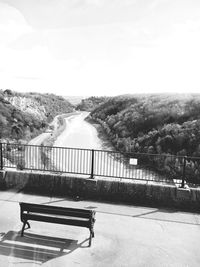 Scenic view of river with mountains in background