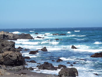 Scenic view of sea against clear sky