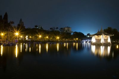 Reflection of illuminated buildings in water