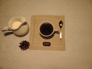 Directly above shot of coffee cup on table