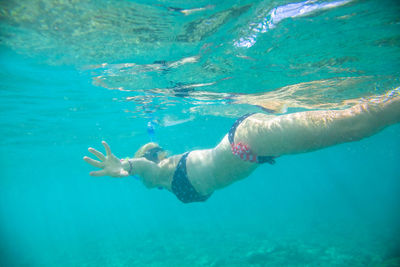 Man swimming in sea