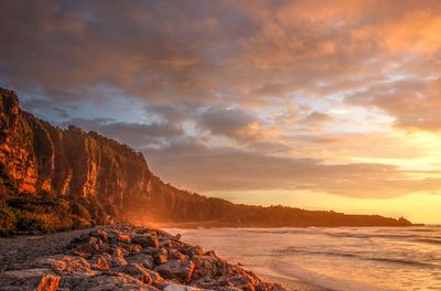 Scenic view of sea against sky during sunset