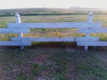 View of empty bench on field