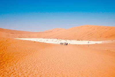 Scenic view of desert against clear sky