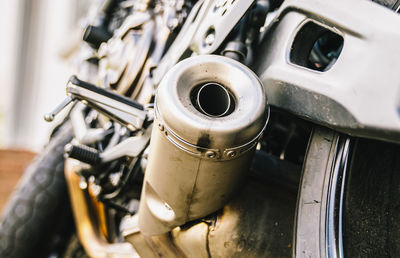 Close-up of exhaust pipe on motorcycle