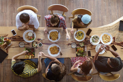 High angle view of people eating food