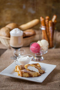 Ice cream cone on table