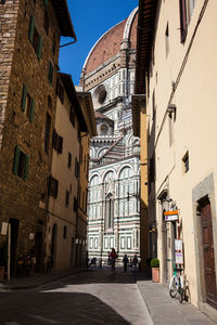 People on the beautiful streets around the florence cathedral