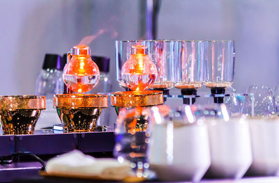 Close-up of glass bottles on table