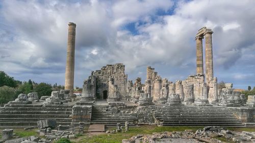 Old temple against cloudy sky