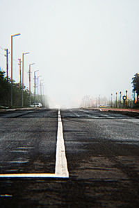 Empty road at sunset