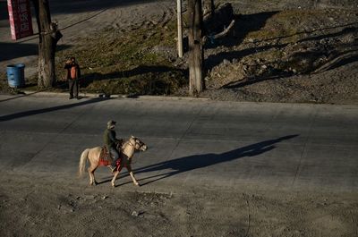 Man riding  on road