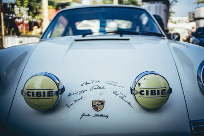 Close-up of vintage car in city