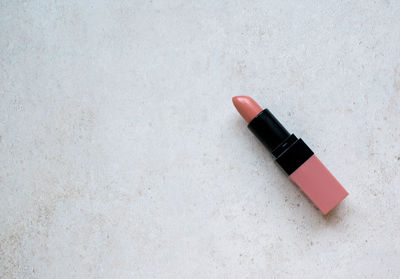 High angle view of lipstick on table