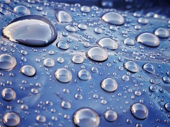 Full frame shot of wet car hood