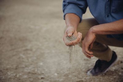 Close-up of man holding hands