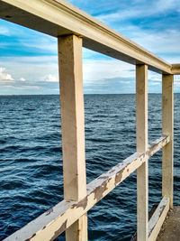 Pier over sea against sky