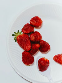 High angle view of strawberries on table