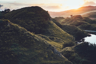 Scenic view of mountains against sky during sunset