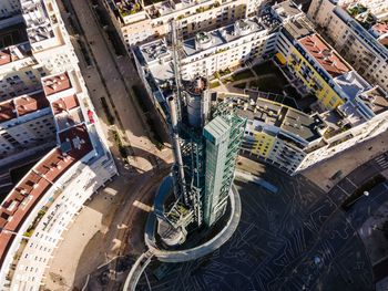 High angle view of street amidst buildings in city