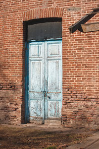 Closed door of abandoned house