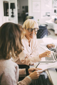 Female coworkers working from home