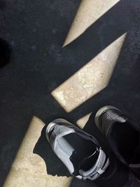 High angle view of shoes on floor