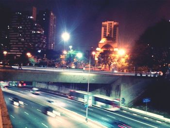 Traffic on city street at night