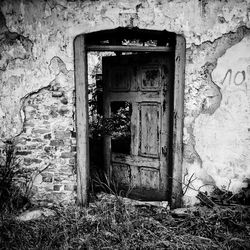 Closed door of abandoned building