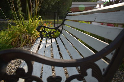 High angle view of empty bench in park