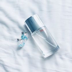 High angle view of bottle on bed