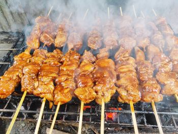 Close-up of meat on barbecue grill