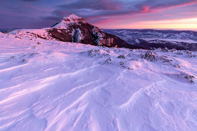 The beauty of winter on the snowy mountains on a cold day in ceahlau mountains - romania