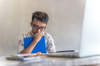 Young man using phone