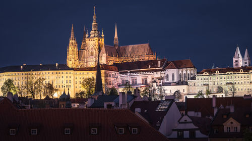Buildings in city at night