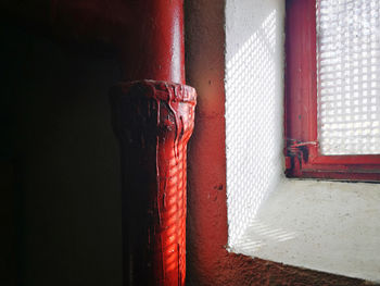 Close-up of pipes against wall