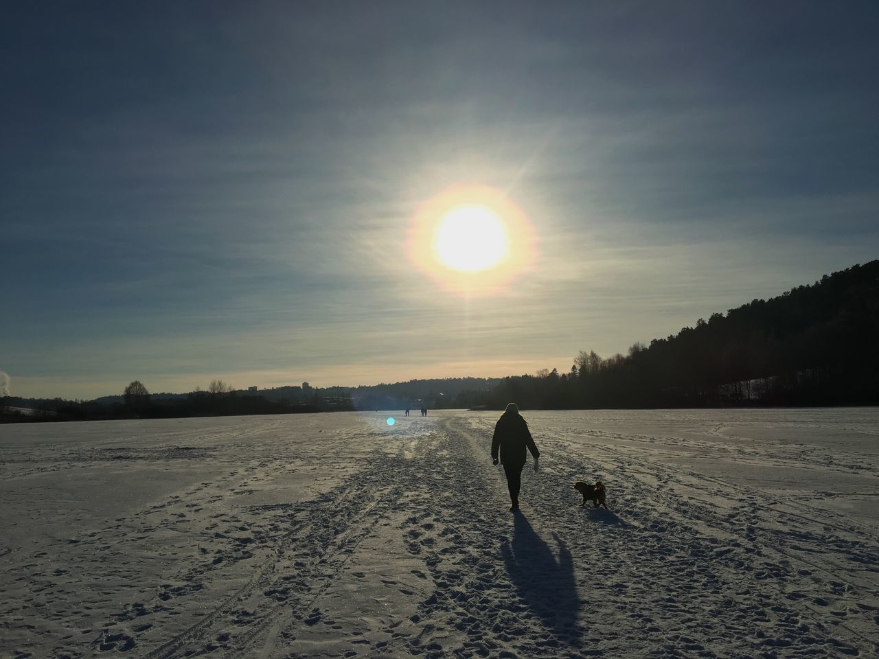 real people, rear view, nature, winter, cold temperature, beauty in nature, one person, scenics, sunset, sun, leisure activity, outdoors, full length, snow, sky, lifestyles, silhouette, tranquility, people, day, adults only, adult, one man only