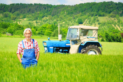 Portrait of smiling woman in farm