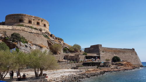 View of fort against clear blue sky