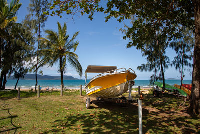 Yellow boat on the beach